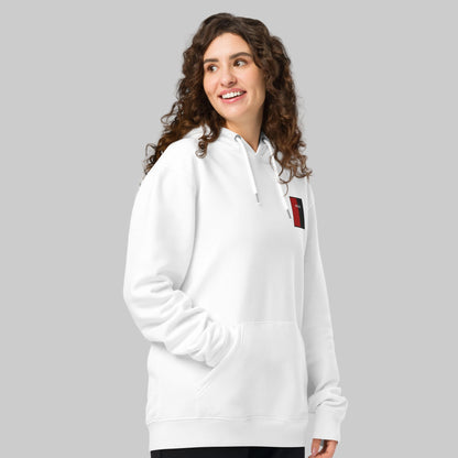 Woman wearing a white hoodie with an Longfort embroidered emblem