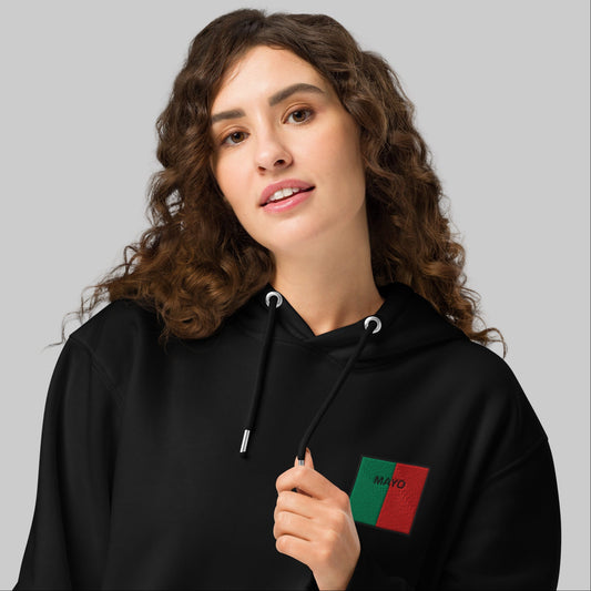 Woman wearing a black hoodie with Mayo emblem 