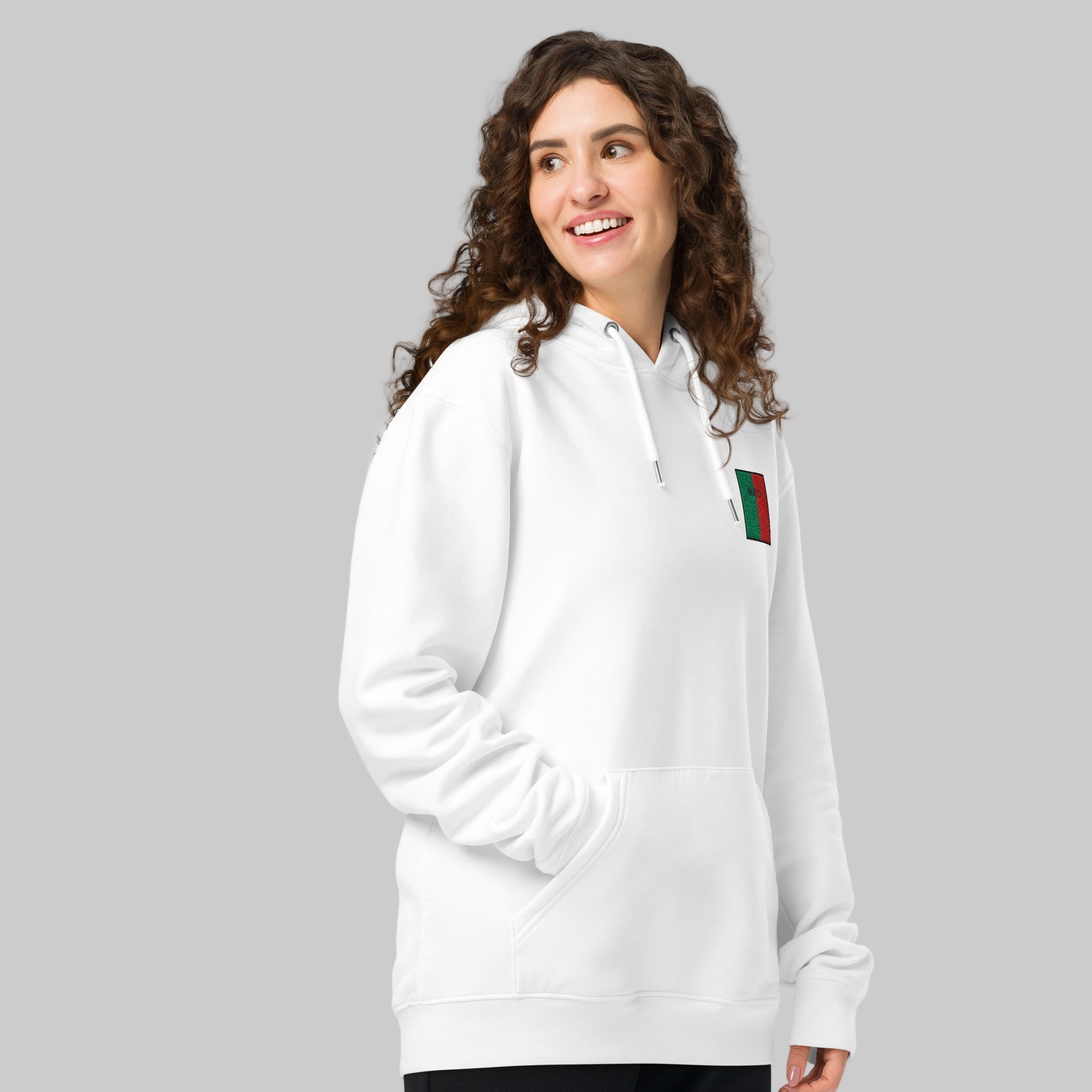 Woman wearing a white hoodie with Mayo emblem on white background