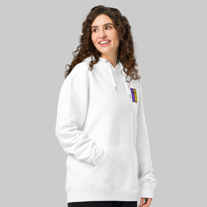 Woman wearing a white hoodie with Wexford emblem 